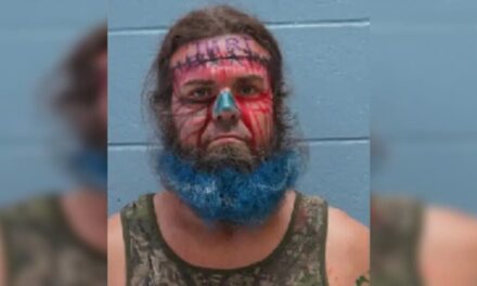 Bearded perp makes it into mugshot Hall of Shame after threatening to bomb beauty store