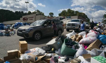 National Guard helicopter crew grounded for flying low over hurricane relief depot and scattering supplies