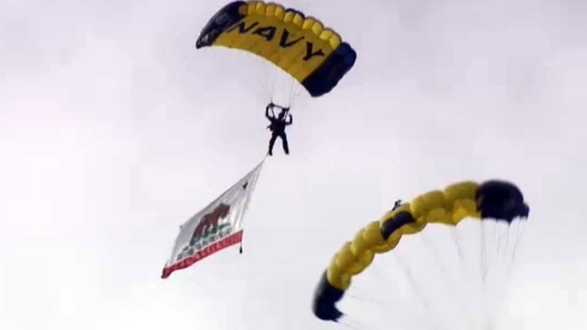 Navy parachutists flying over San Francisco