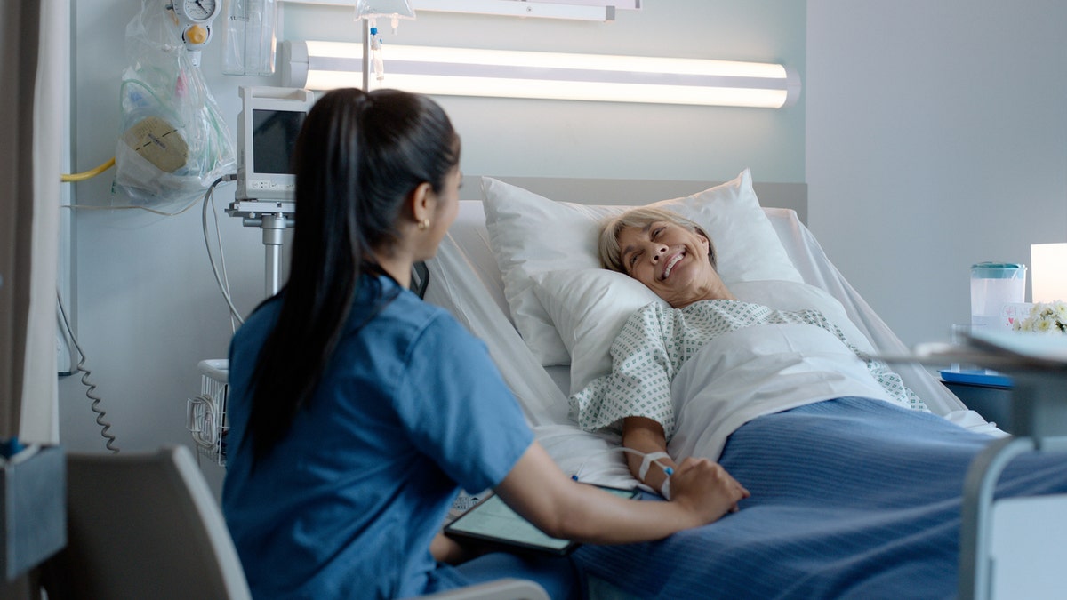 Nurse talking with patient