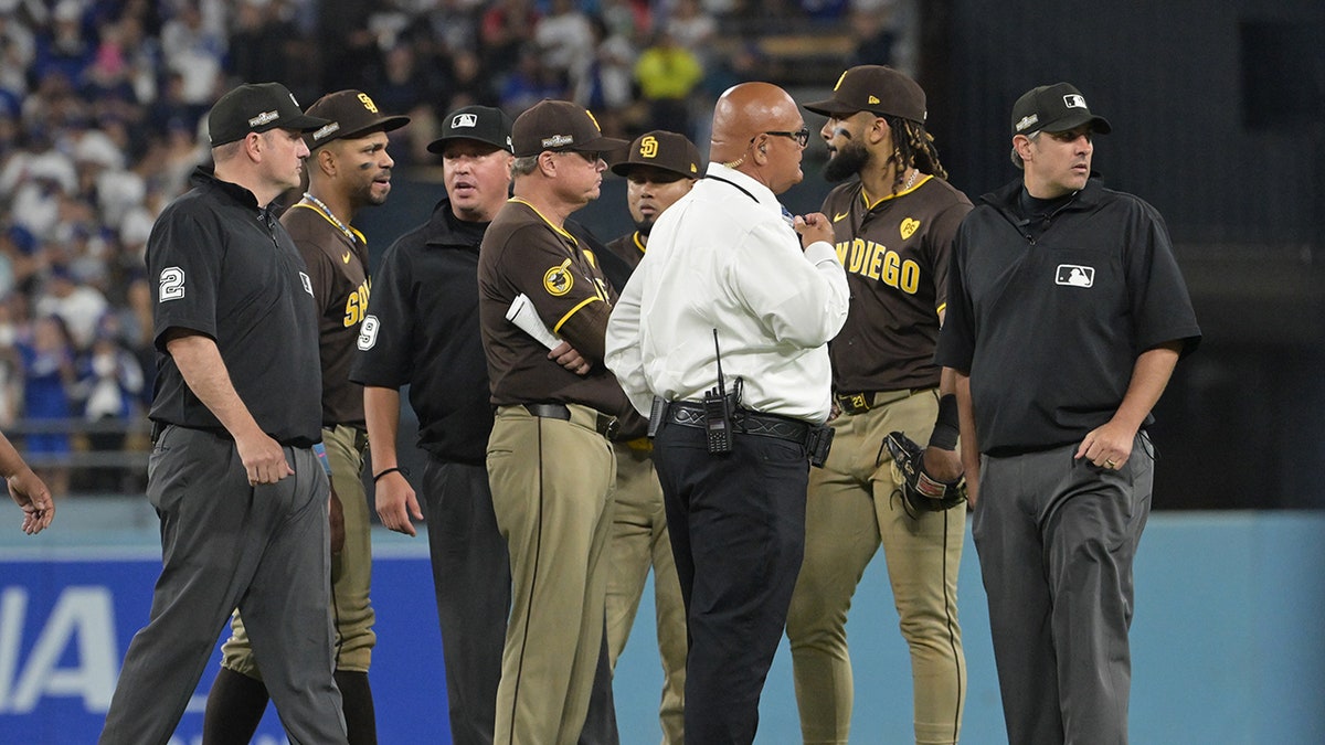 Padres, umpires and security discuss on field