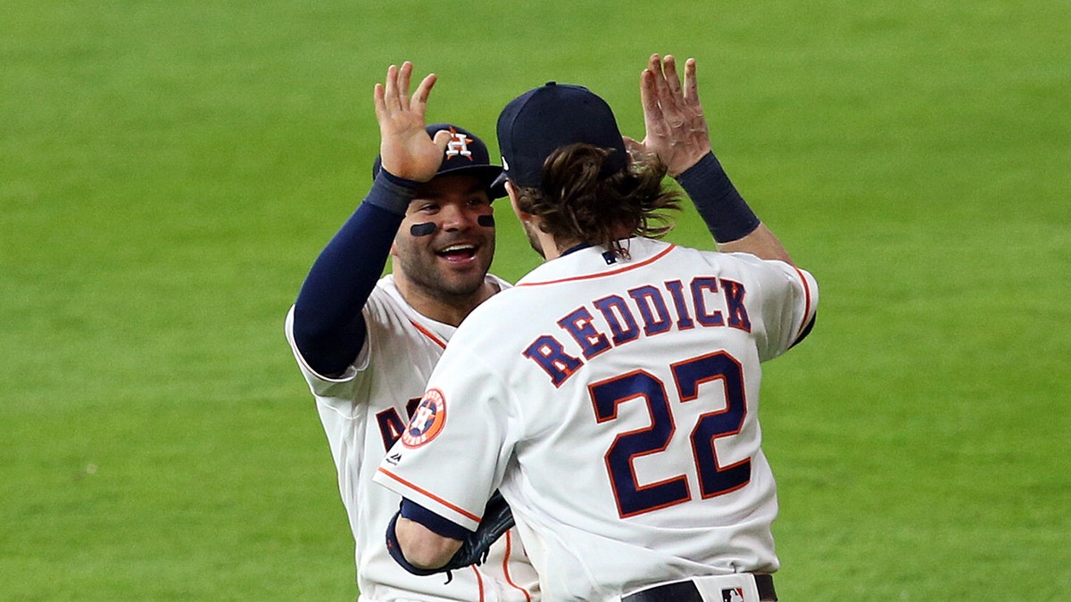 Jose Altuve and Josh Reddick