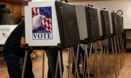 Republicans cry foul after Pennsylvania official who encouraged voters to stay despite long lines arrested at polling station