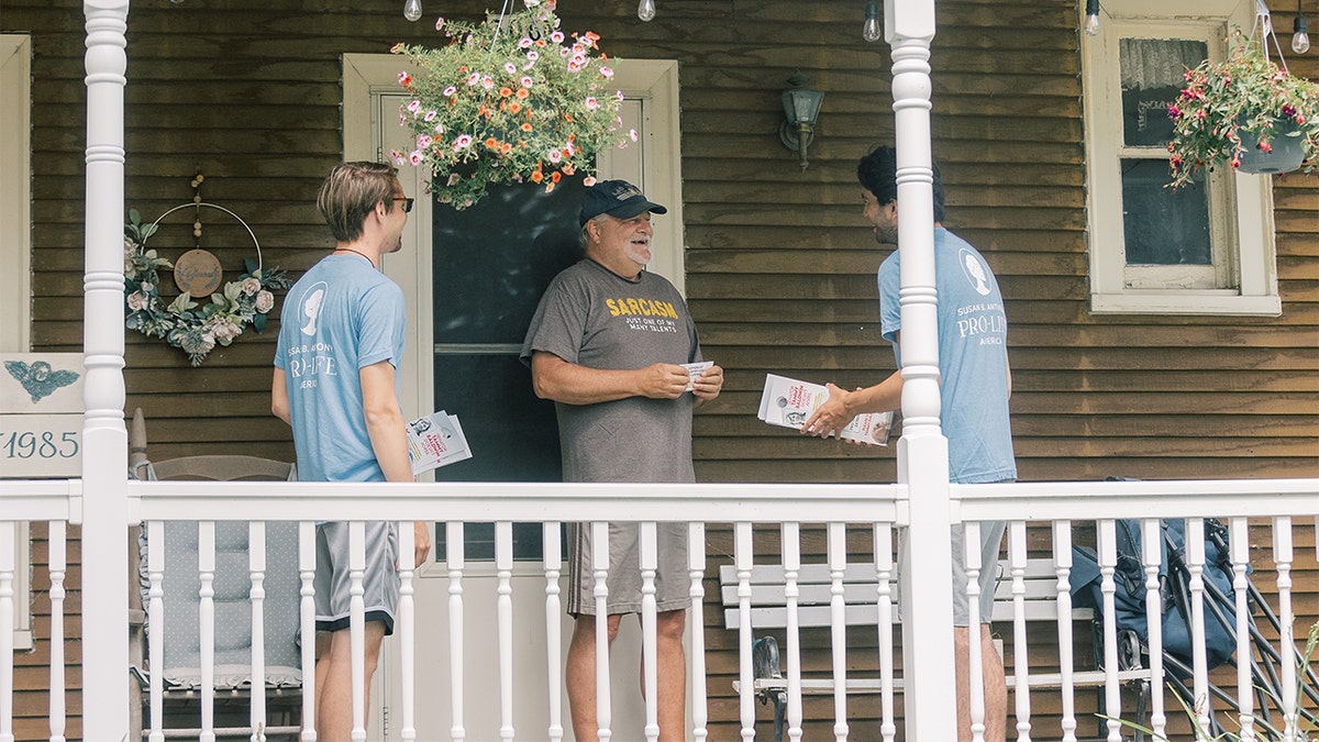 SBA Pro-Life America canvassers talk to a voter