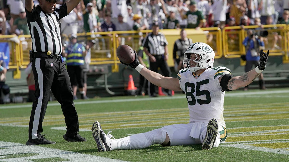 Tucker Kraft celebrates touchdown