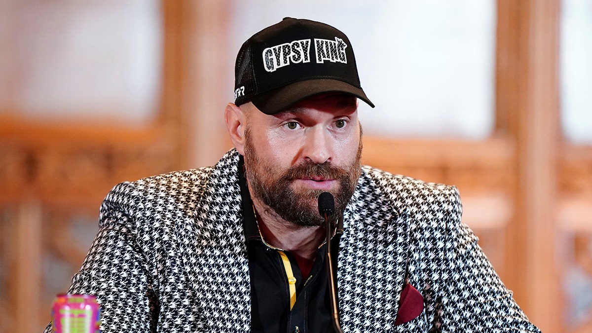 Tyson Fury talks to media