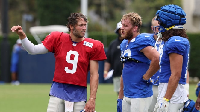 Los Angeles Rams QB Matthew Stafford talks with WRs Cooper Kupp and Puka Nacua during offseason training camp. (Kiyoshi Mio-Imagn Images)