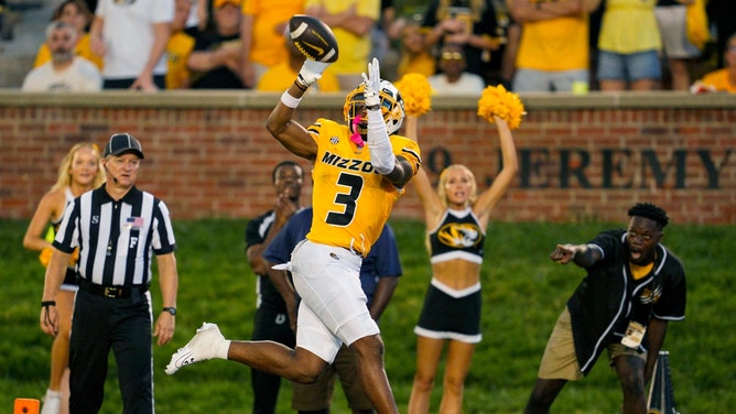 Missouri Tigers WR Luther Burden III (3) catches a touchdown pass against the Vanderbilt Commodores at Faurot Field at Memorial Stadium. (Jay Biggerstaff-Imagn Images)