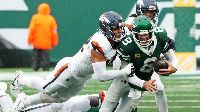 The Denver Broncos sack New York Jets QB Aaron Rodgers at MetLife Stadium. (Robert Deutsch-Imagn Images)