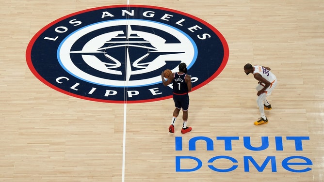 Los Angeles Clippers PG James Harden handles the ball around half-court with Phoenix Suns All-Star Kevin Durant played defense at Intuit Dome. (Kirby Lee-Imagn Images)