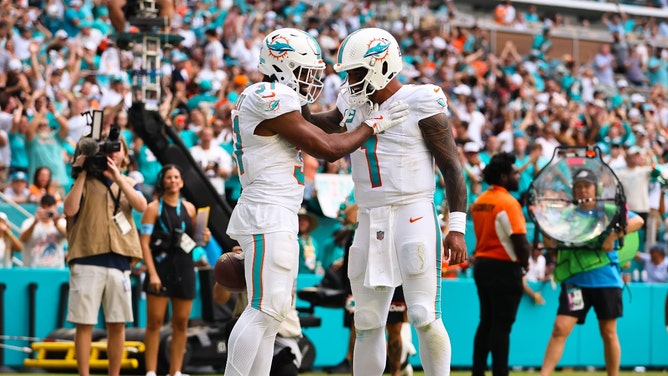 Miami Dolphins RB Raheem Mostert celebrates a touchdown with QB Tua Tagovailoa vs. the Arizona Cardinals at Hard Rock Stadium in Florida. (Sam Navarro-Imagn Images)