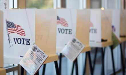 Georgia reports record turnout on first day of early voting, with over 328,000 people casting votes or requesting absentee ballots