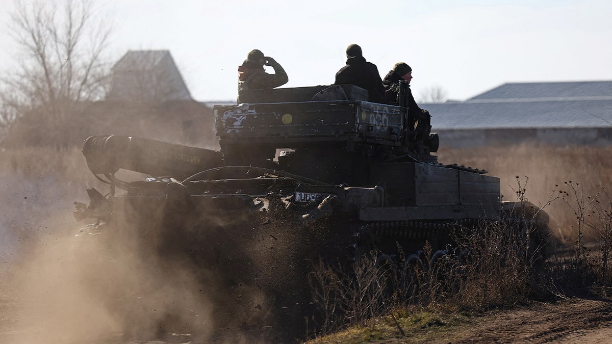 Military men in a tank