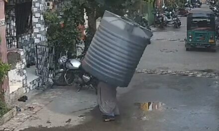 Video captures water tank falling on woman — but she miraculously escapes injury