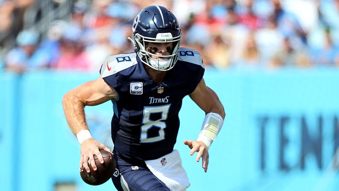 An NFL official took a vicious hit from Tennessee Titans QB Will Levis and appeared to suffer a brutal lower-body injury.