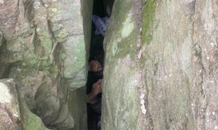 Woman becomes stuck upside down between boulders for 7 hours while trying to retrieve dropped phone