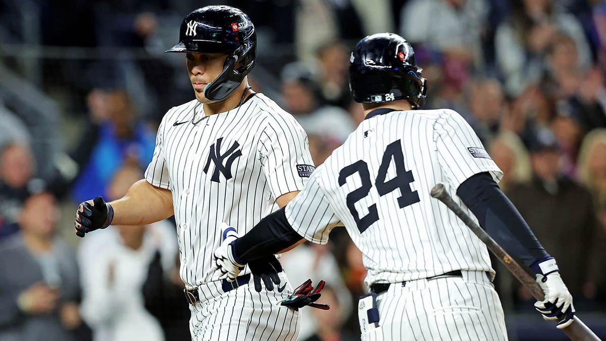 Yankees celebrate run scored