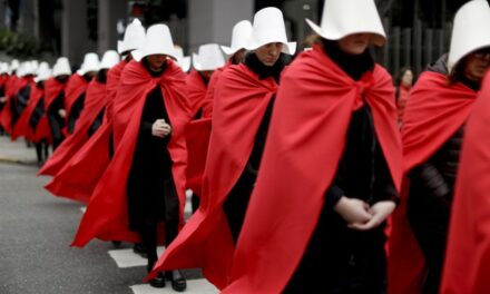 Just Like Old Times: Democrat Woman Wears Robe and Pointy Hat to the Voting Booth