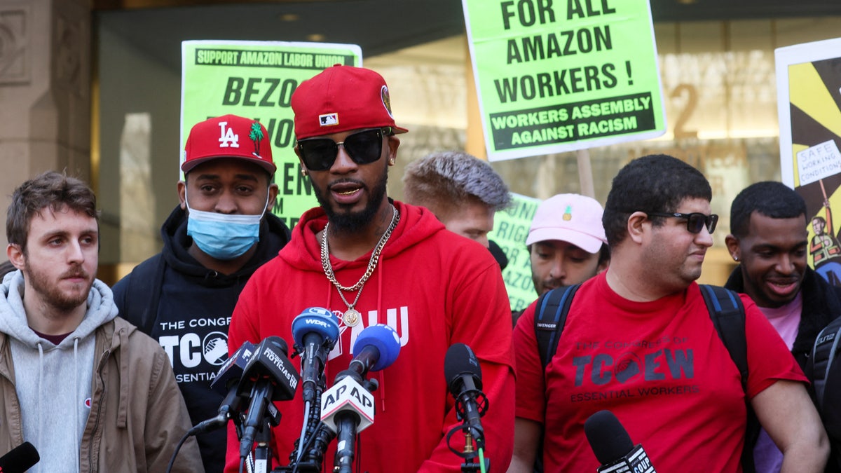 Amazon Labor Union (ALU) organizer Christian Smalls speaks to the media as ALU members celebrate official victory after hearing results regarding the vote to unionize outside the NLRB offices in Brooklyn, New York, on April 1, 2022.