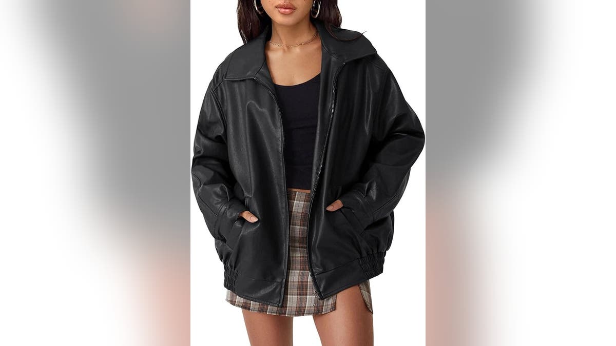 An oversized leather jacket keeps you warm and looking cool. 