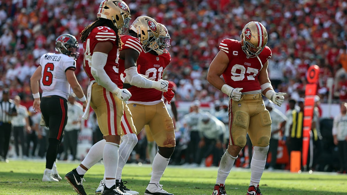 Nick Bosa with his teammates