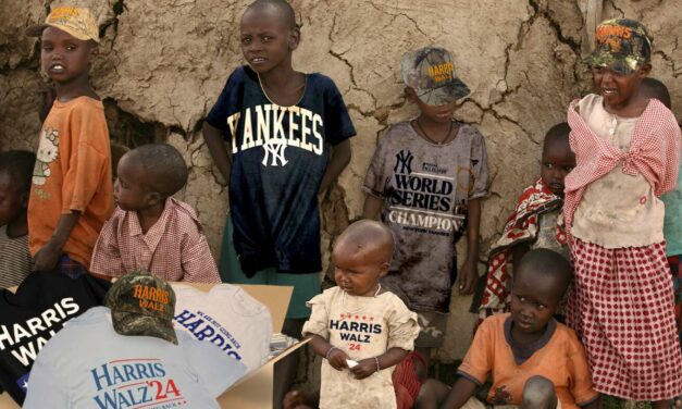 Insult To Injury: African Kids Receive Overstock Harris-Walz Hats To Wear With Their Yankees World Championship Shirts