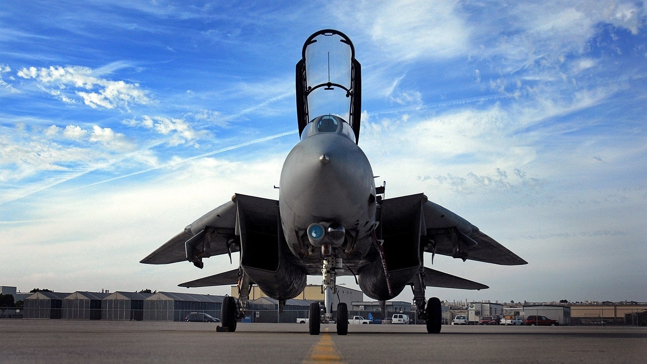 A U.S. Navy F-14D Tomcat aircraft from Fighter Squadron 31, sits on the flight line after completing its final flight at Naval Base North Island, San Diego, Calif., on Sept. 29, 2006. After 36 years of service, the Tomcat is being replaced by the F/A-18E/F Super Hornet aircraft. Image Credit: Creative Commons.