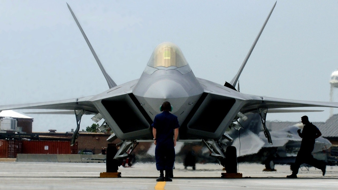 F-22 A Raptor Demonstration Team aircraft maintainers prepare to launch out Maj. Paul 