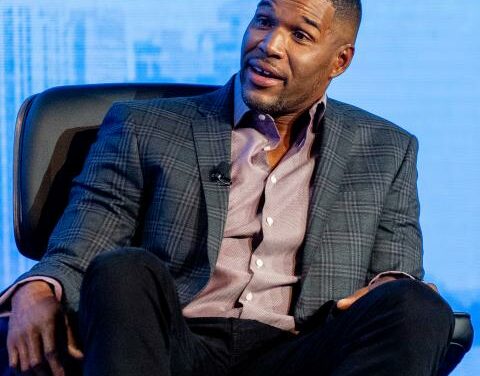 Michael Strahan says he was not protesting when he didn’t put hand on heart during national anthem