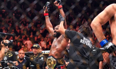 Jon ‘Bones’ Jones Does Trump’s Signature Dance After TKO Win, Hands Title Belt To President-Elect