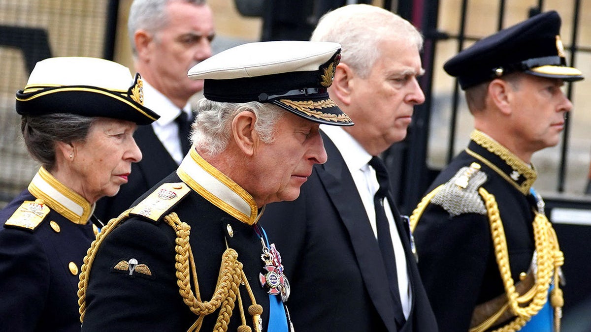 Prince Andrew marching alongside his siblings during Queen Elizabeth II's funeral.