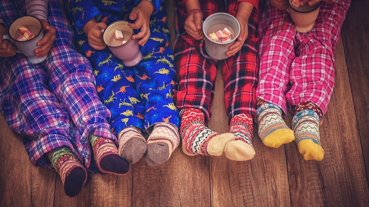 Little kids drinking hot chocolate