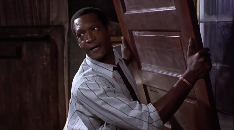 Tony Todd needs to hammer something out to keep the ghouls away in Night of the Living Dead (1990), Columbia Pictures 