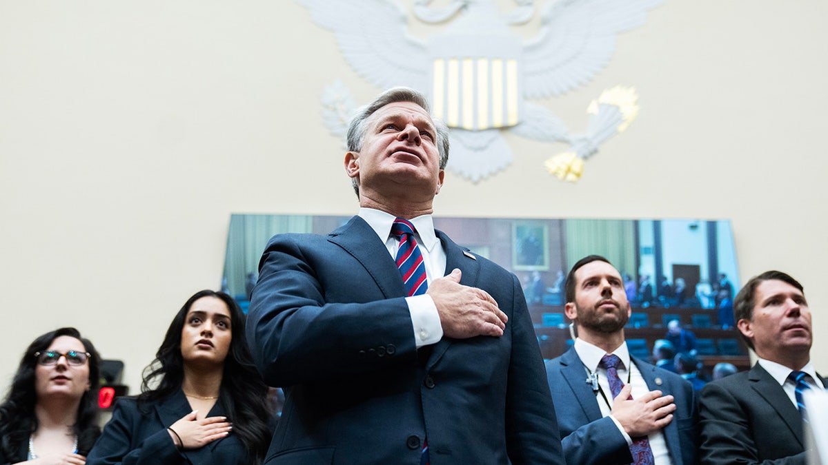 FBI Director Christopher Wray recites the Pledge of Allegiance during the House Judiciary Committee hearing titled 