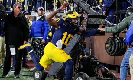 Michigan’s trick play fails miserably; backup quarterback gets leveled by television camera