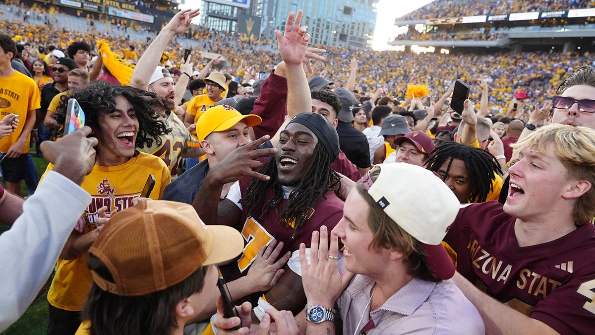 Arizona State fans on field