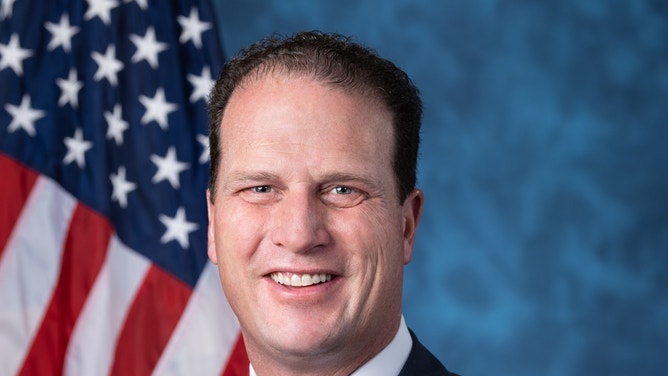 Texas Rep. August Pfluger (pictured) sent a letter to the U.S. Department of Defense after an Air Force Academy graduate was prevented from wearing a t-shirt during a volleyball match against SJSU.