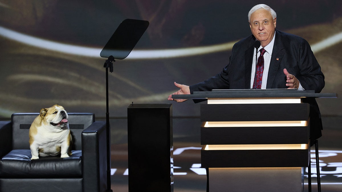 Gov. of West Virginia Jim Justice speaks accompanied by Babydog on Day 2 of the Republican National Convention