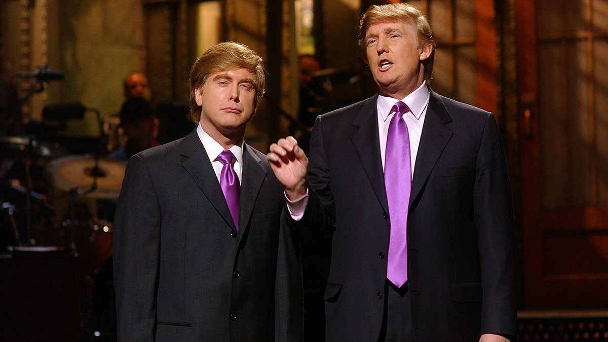 Darrell Hammond standing next to Donald Trump on 