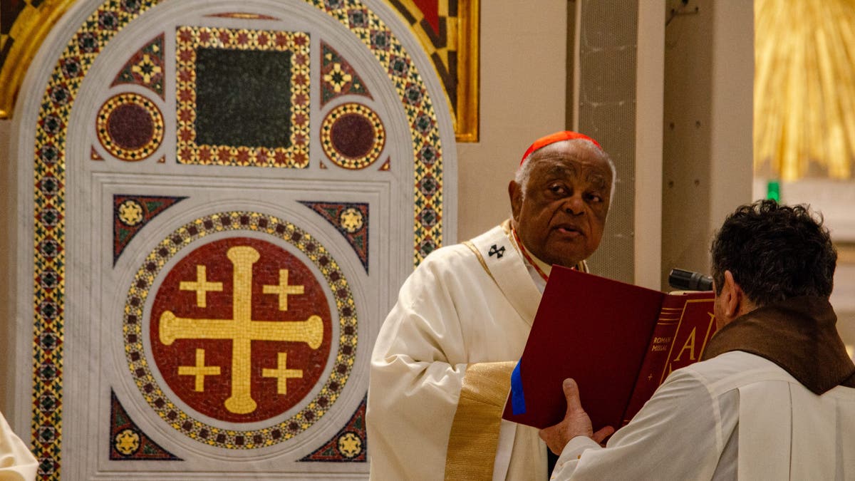 Cardinal Wilton Gregory of the Archdiocese of Washington celebrates a Catholic Mass at the Franciscan Monastery of the Holy Land in America in Washington, D.C. A mosaic of the 