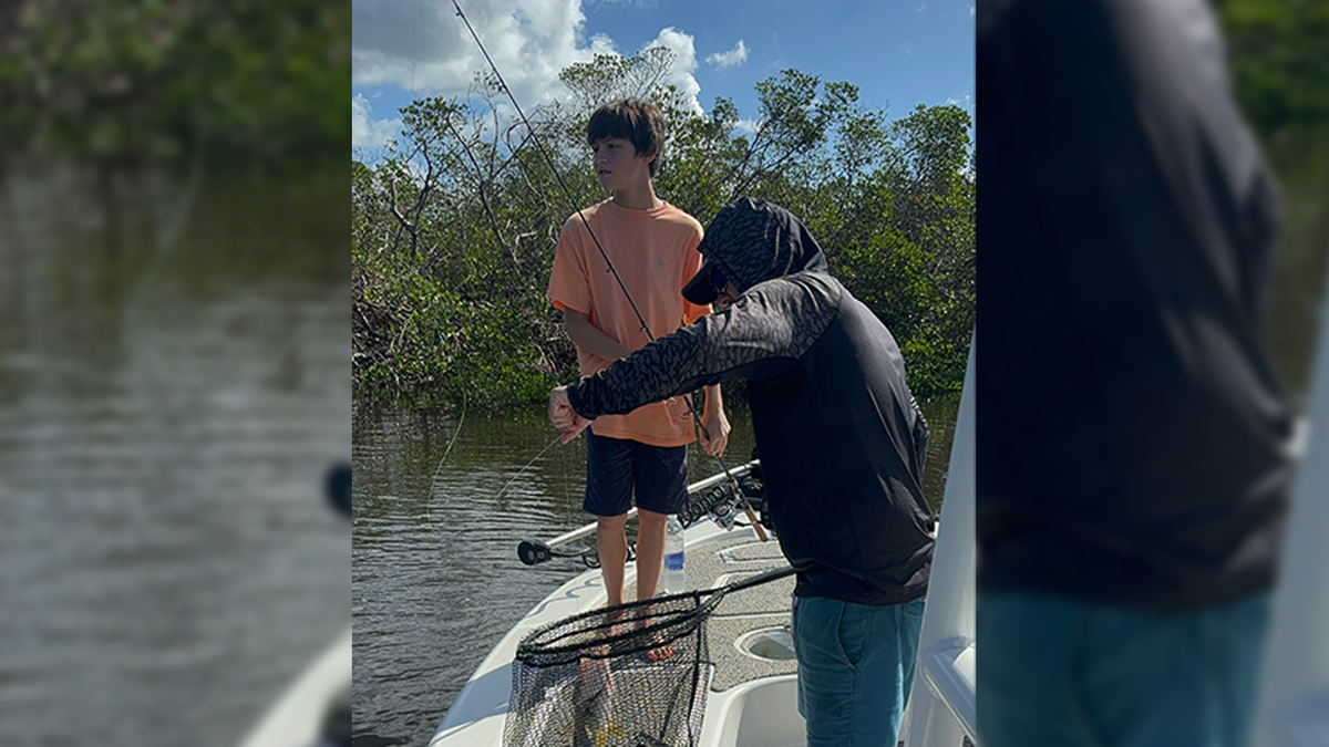 Florida fishing captain and boy