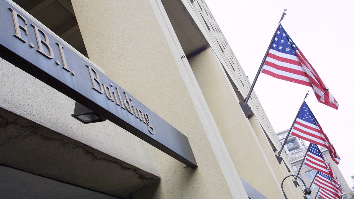 FBI building with American flags.