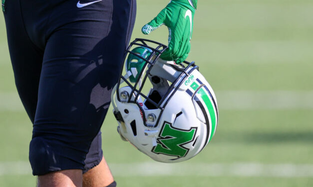 Ball Boy Tries To Snatch Football From Marshall Player, Gets Slammed To The Turf In Wild Scene