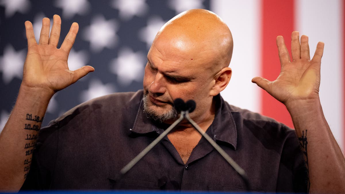 Fetterman puts his hands up on Pennsylvania debate stage