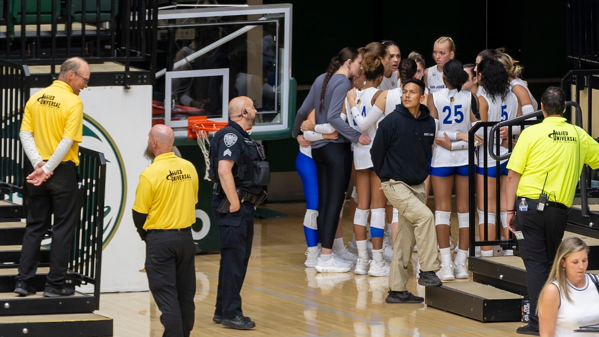 The San Jose State University Spartans are flanked by Moby Arena security, campus police and their own private guard during an NCAA Mountain West women’s volleyball game against the Colorado State University Rams at Moby Arena in Fort Collins, Colo., on Thursday, Oct. 3, 2024.