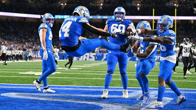 Detroit Lions WR Amon-Ra St. Brown celebrates a touchdown against the Jacksonville Jaguars game at Ford Field. (Steven King/Icon Sportswire)