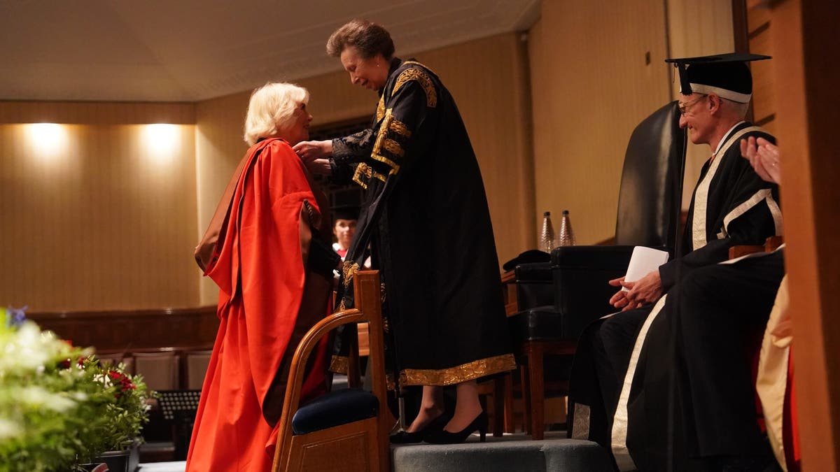 anne presenting doctorate to camilla