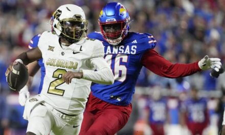 Security Lights Up Fan After Kansas Upsets Colorado: WATCH