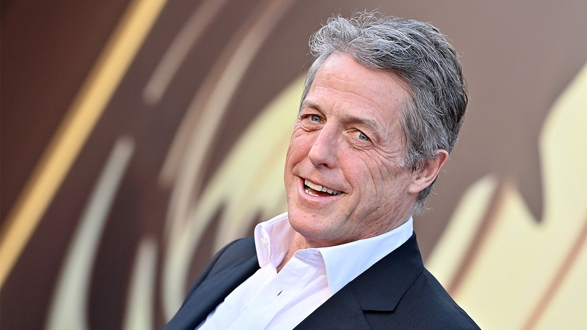 Hugh Grant smiling