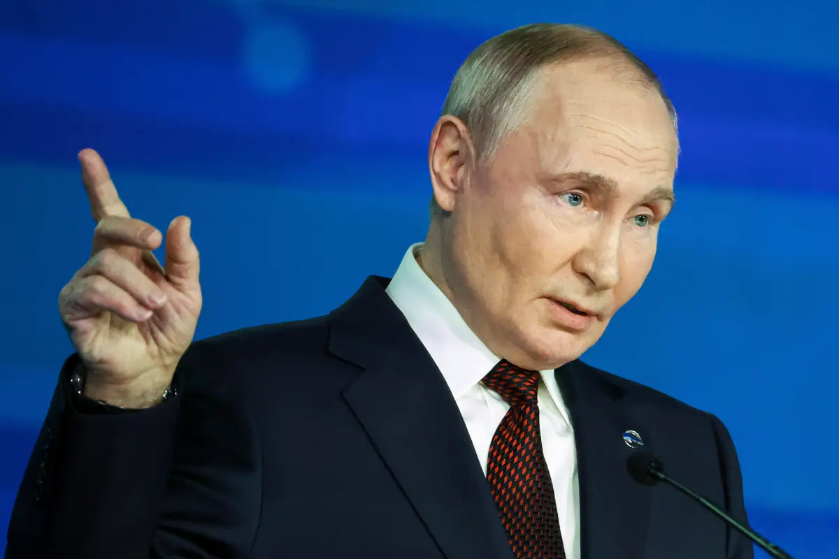 Russian President Vladimir Putin points during a meeting with foreign policy experts at the Valdai Discussion Club in the Black Sea resort of Sochi, Russia, on Nov. 7, 2024. (Maxim Shipenkov/Pool Photo via AP)